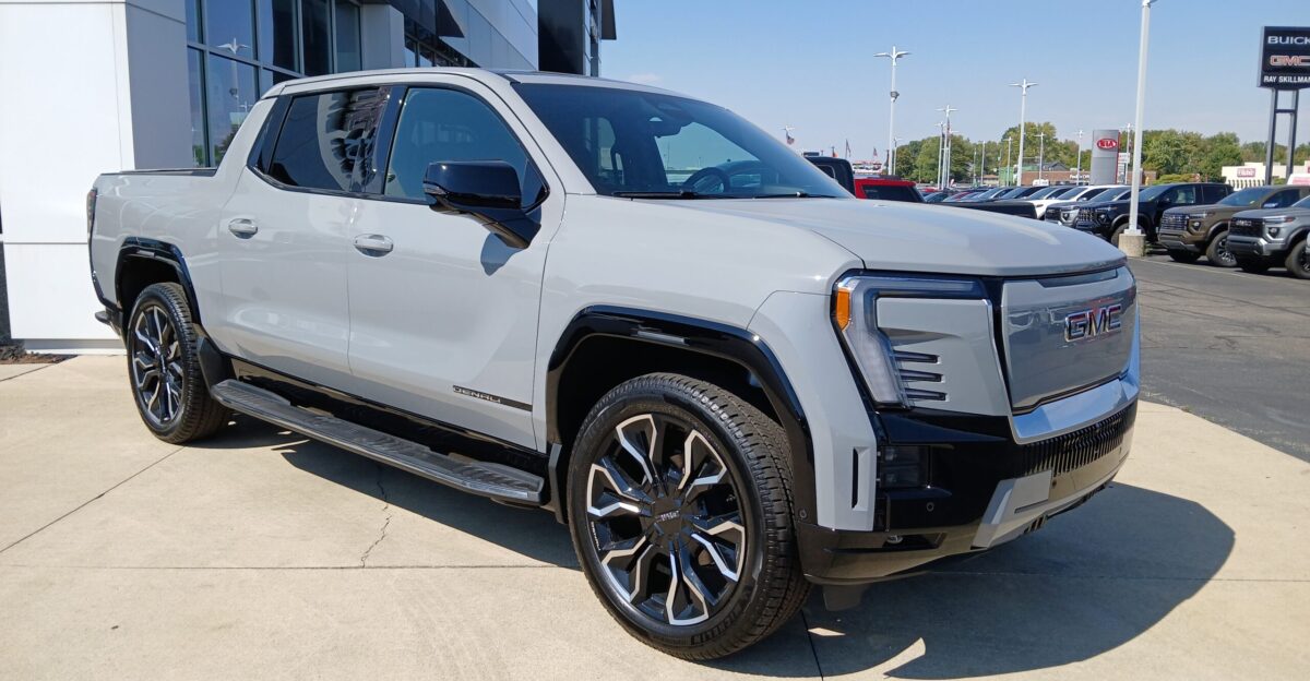 Front view of a 2024 GMC Sierra EV Denali crew cab full-size electric pickup truck