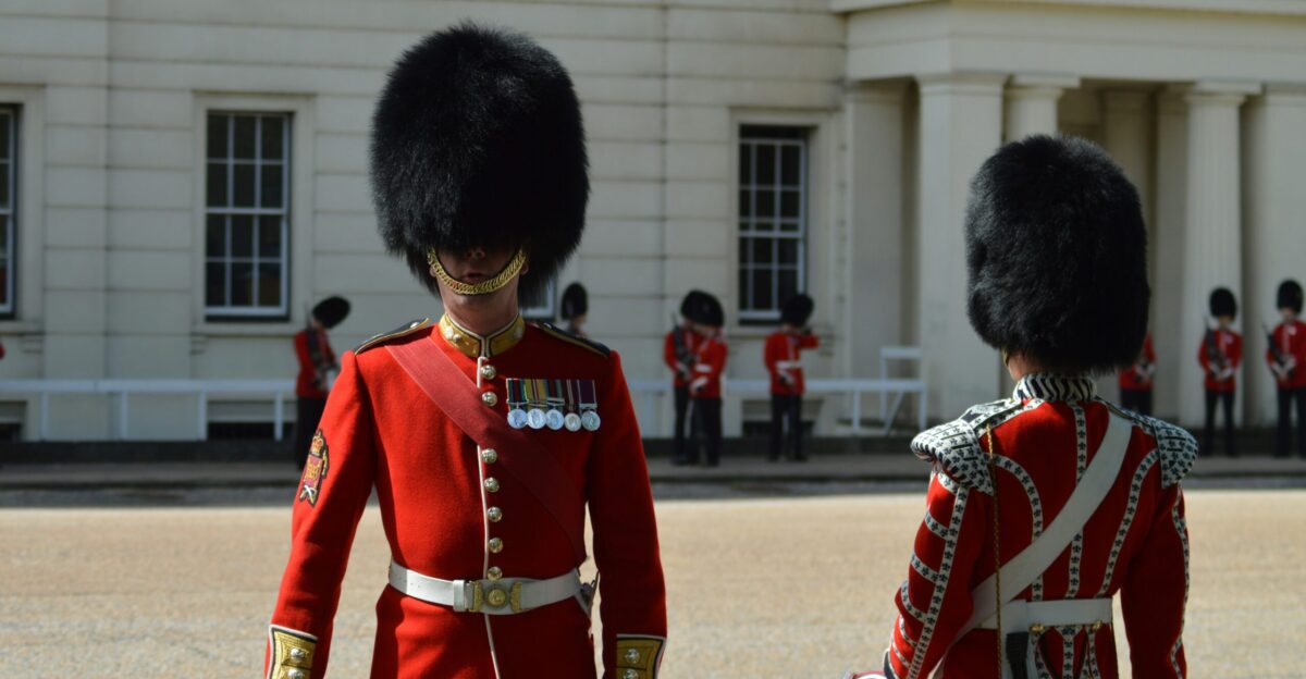 soldier near white building during daytime