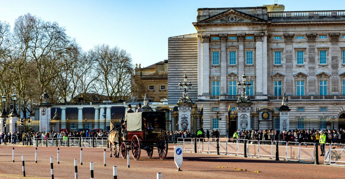 people walking on park near building during daytime