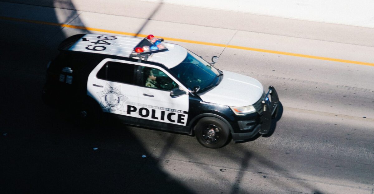 a police car parked on the side of the road